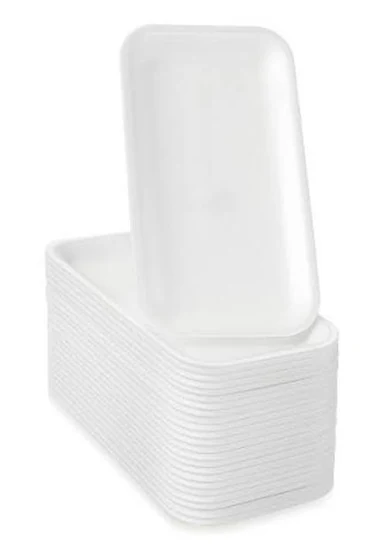 Stack of white polystyrene meat trays